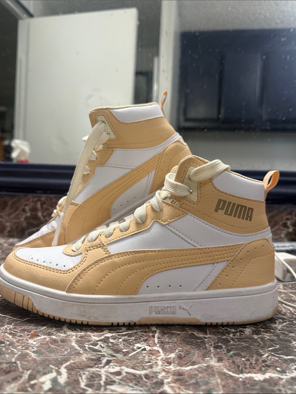 Puma women’s High-Top Sneakers in Cream & White